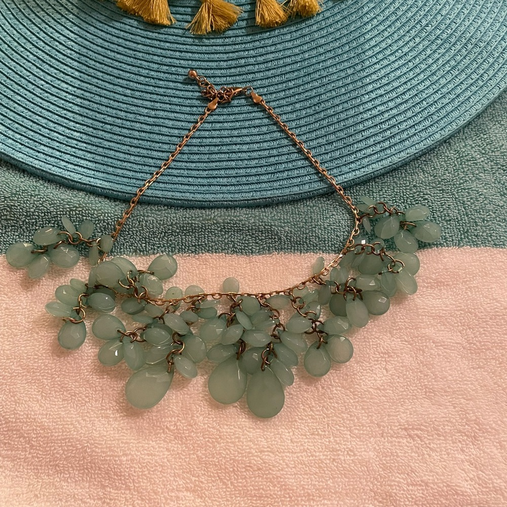 Turquoise necklace casual in style .